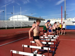 Author Liam Hennessy and Assistant coach Ronnie focusing on their hurdle drills